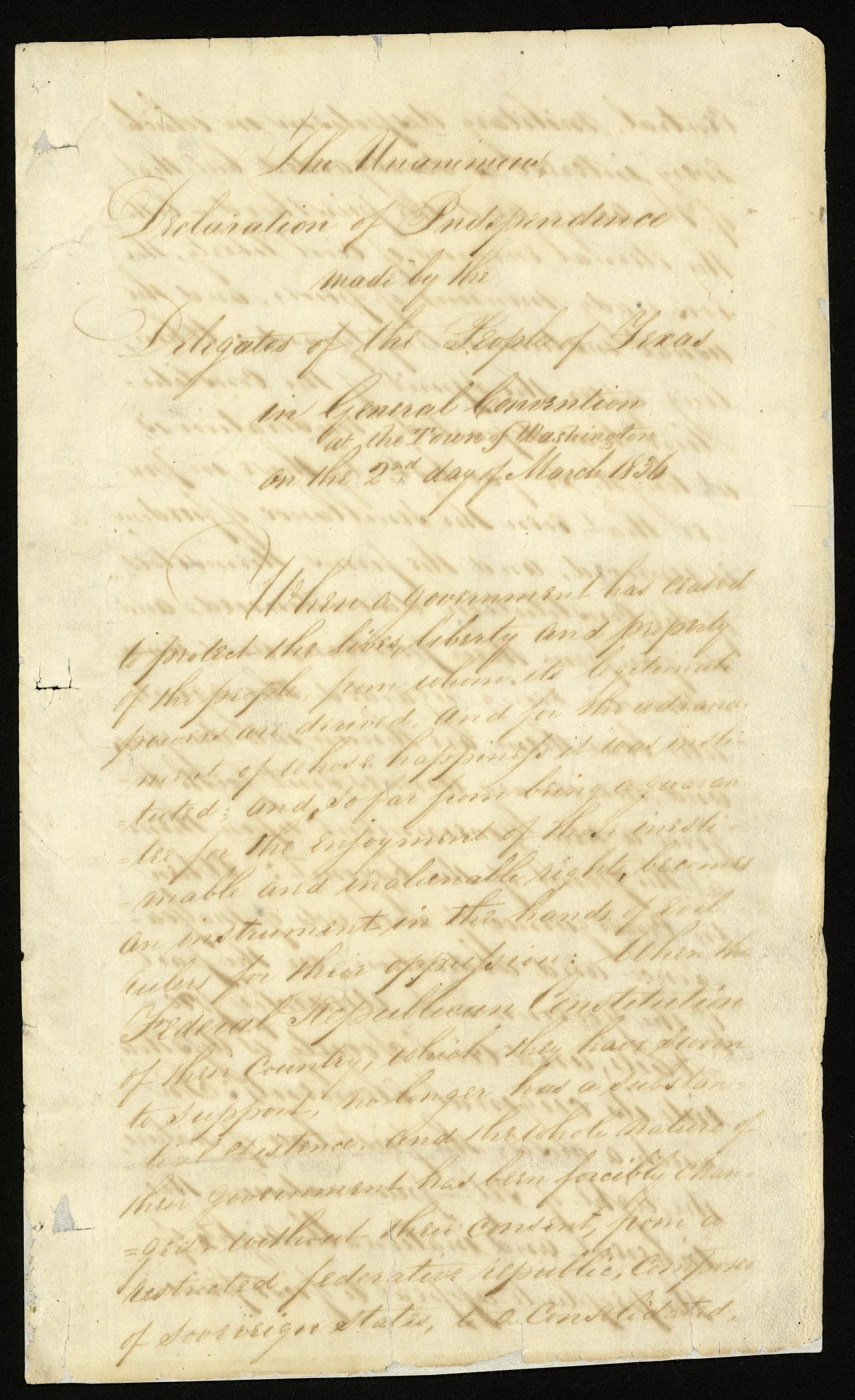 First page of the handwritten Texas Declaration of Independence on aged paper, its title written in large script above dense lines of ink text.